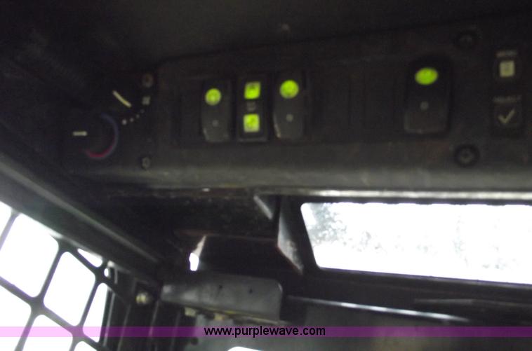 image for item 5772 2007 John Deere 317A skid steer