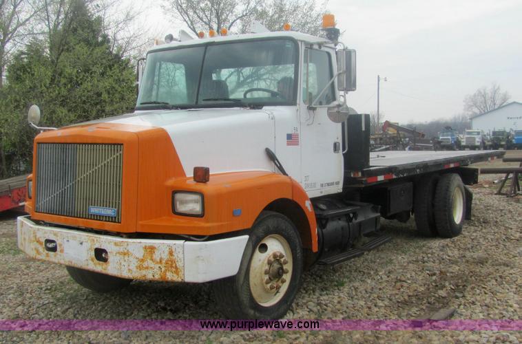 image for item 6174 1990 GM Volvo WG Rollback truck