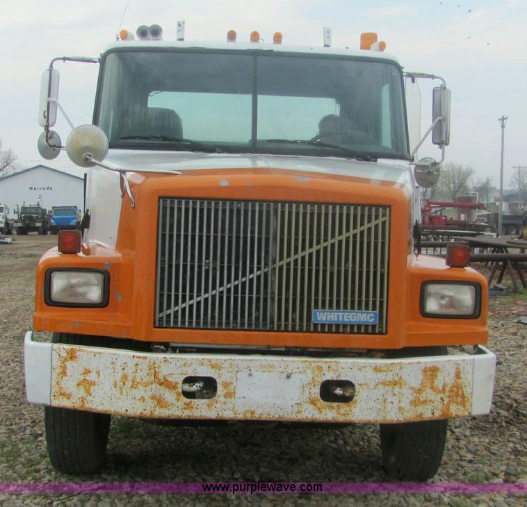 image for item 6174 1990 GM Volvo WG Rollback truck