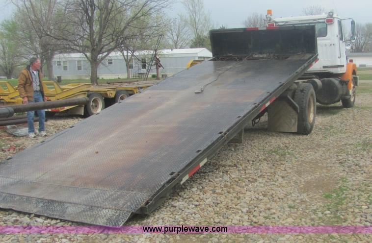 image for item 6174 1990 GM Volvo WG Rollback truck