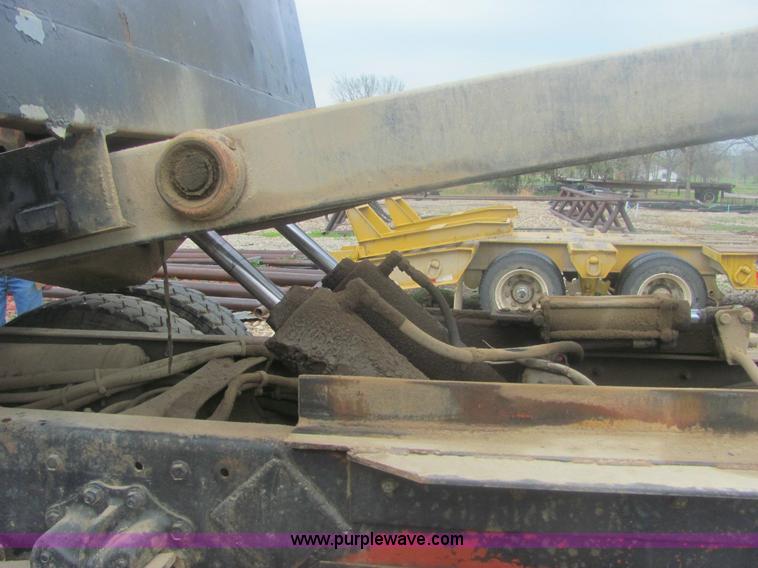 image for item 6174 1990 GM Volvo WG Rollback truck