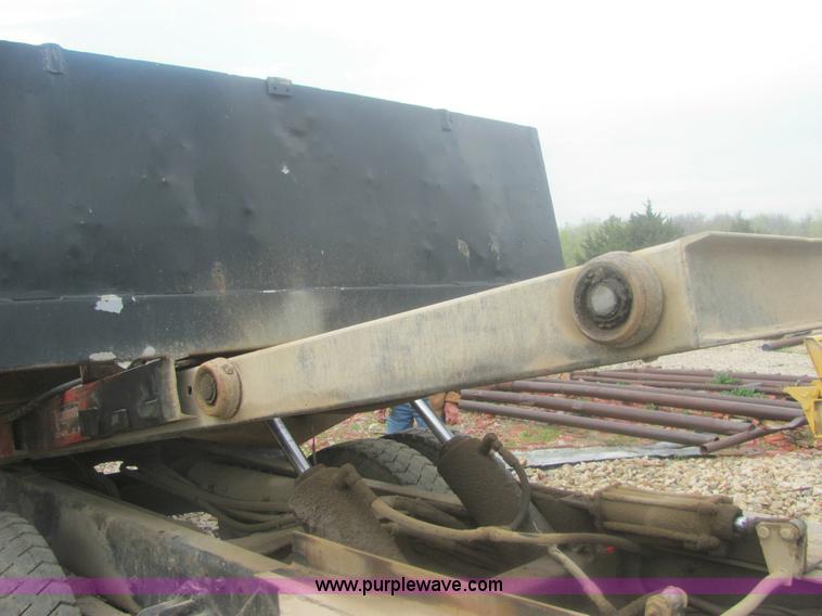 image for item 6174 1990 GM Volvo WG Rollback truck