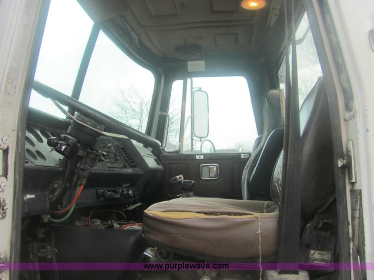 image for item 6174 1990 GM Volvo WG Rollback truck