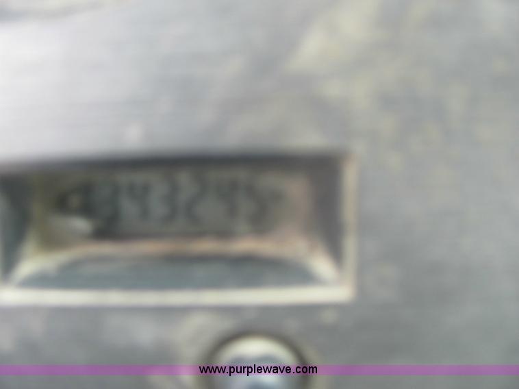 image for item 6174 1990 GM Volvo WG Rollback truck