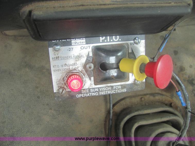 image for item 6174 1990 GM Volvo WG Rollback truck