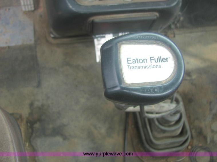 image for item 6174 1990 GM Volvo WG Rollback truck