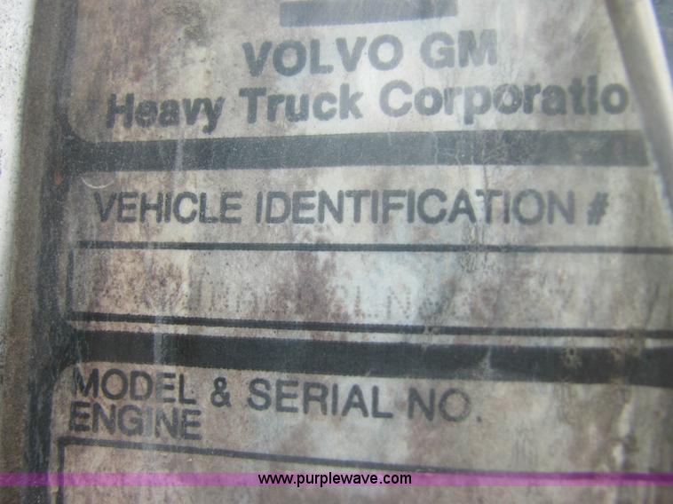 image for item 6174 1990 GM Volvo WG Rollback truck