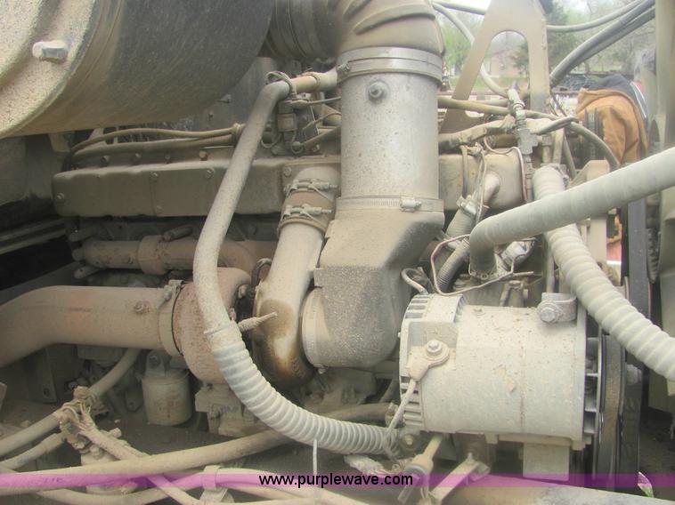 image for item 6174 1990 GM Volvo WG Rollback truck