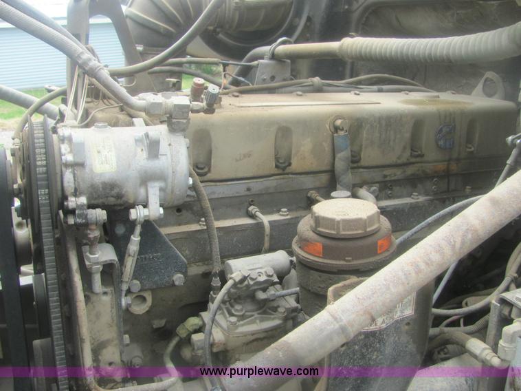 image for item 6174 1990 GM Volvo WG Rollback truck