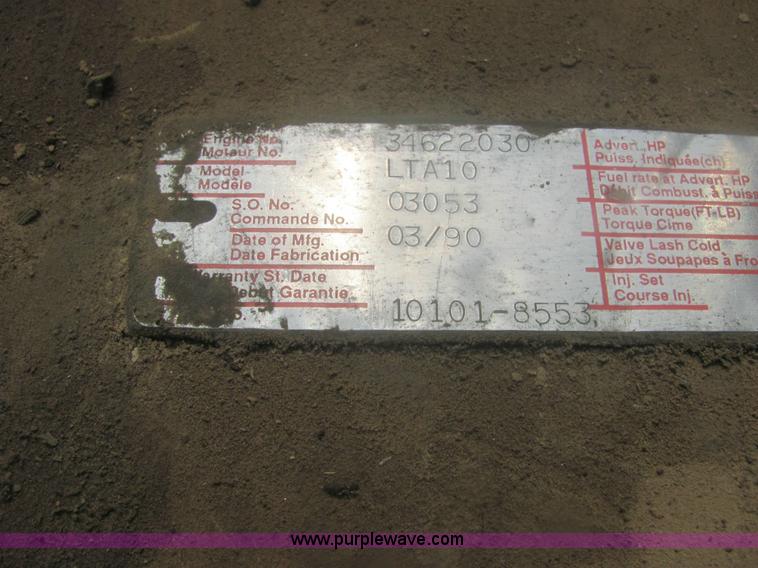 image for item 6174 1990 GM Volvo WG Rollback truck