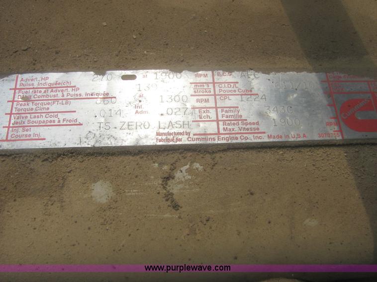 image for item 6174 1990 GM Volvo WG Rollback truck