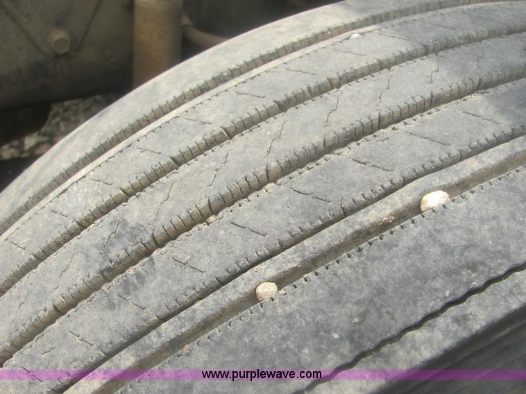 image for item 6174 1990 GM Volvo WG Rollback truck