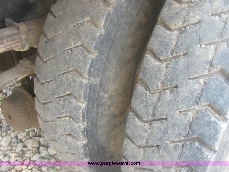 image for item 6174 1990 GM Volvo WG Rollback truck