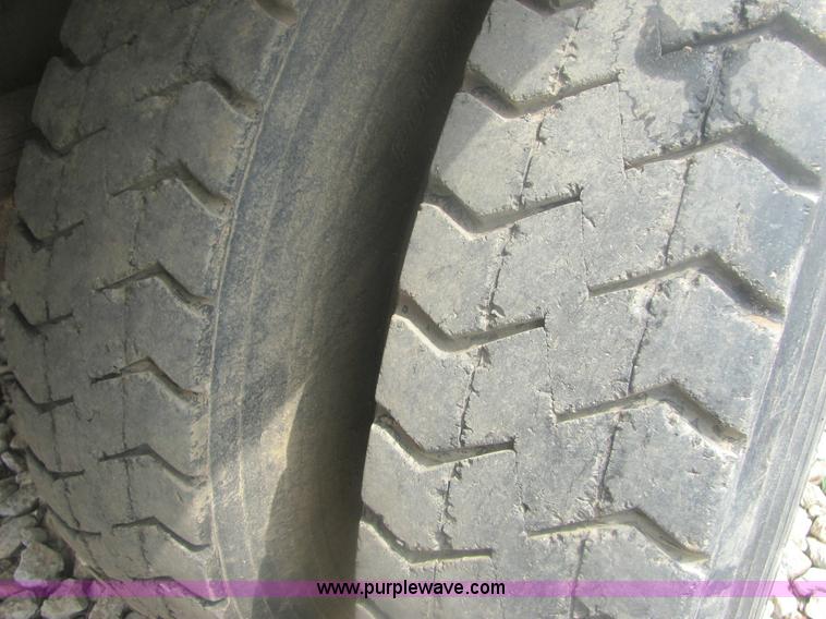 image for item 6174 1990 GM Volvo WG Rollback truck