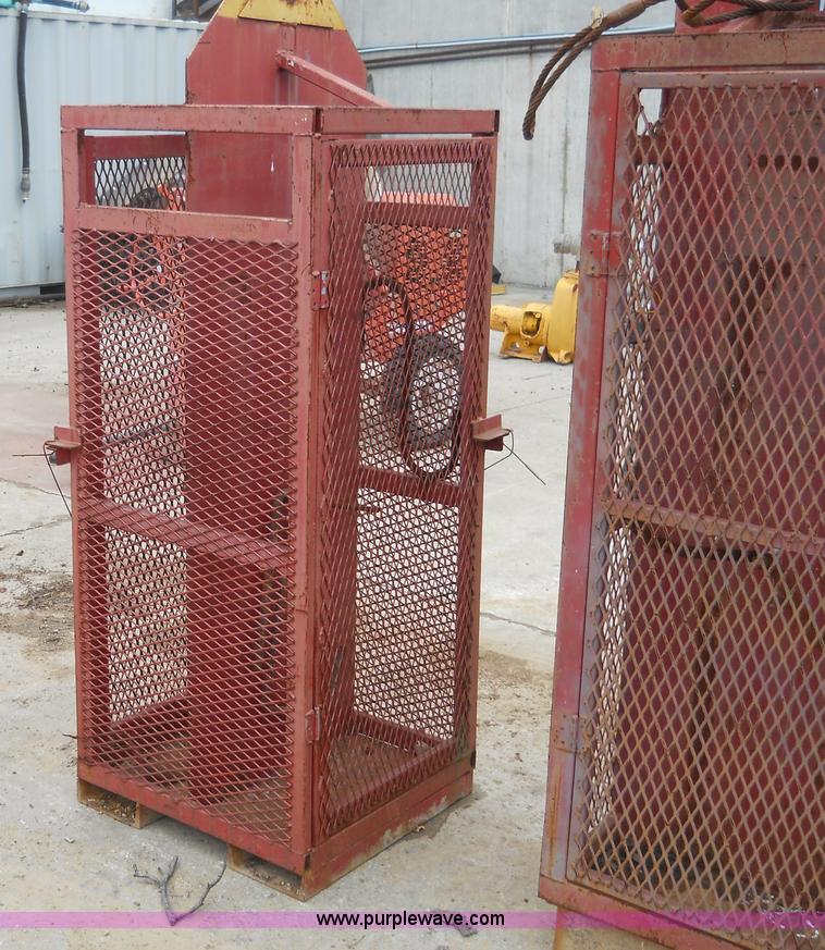 image for item 7837 (2) propane bottle cages