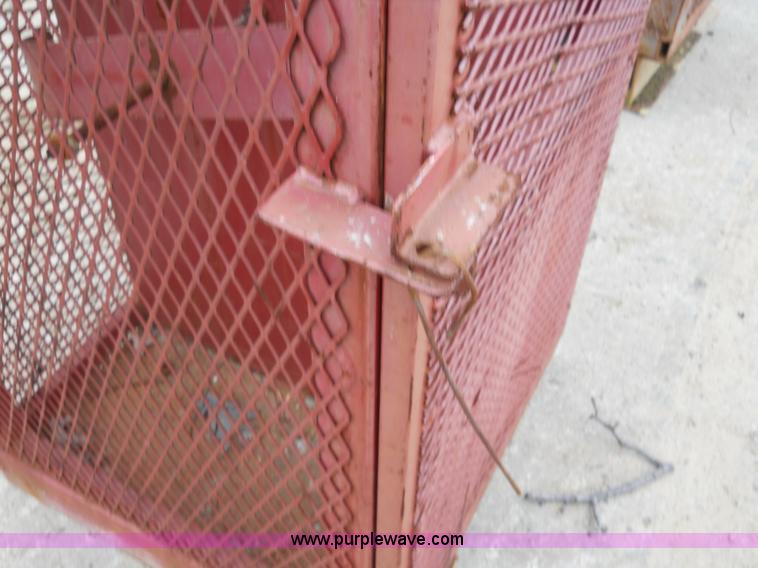 image for item 7837 (2) propane bottle cages