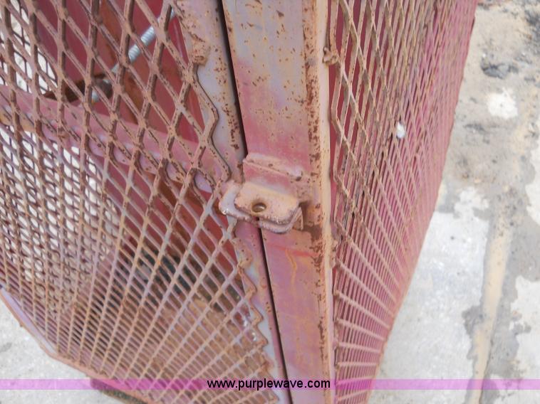 image for item 7837 (2) propane bottle cages