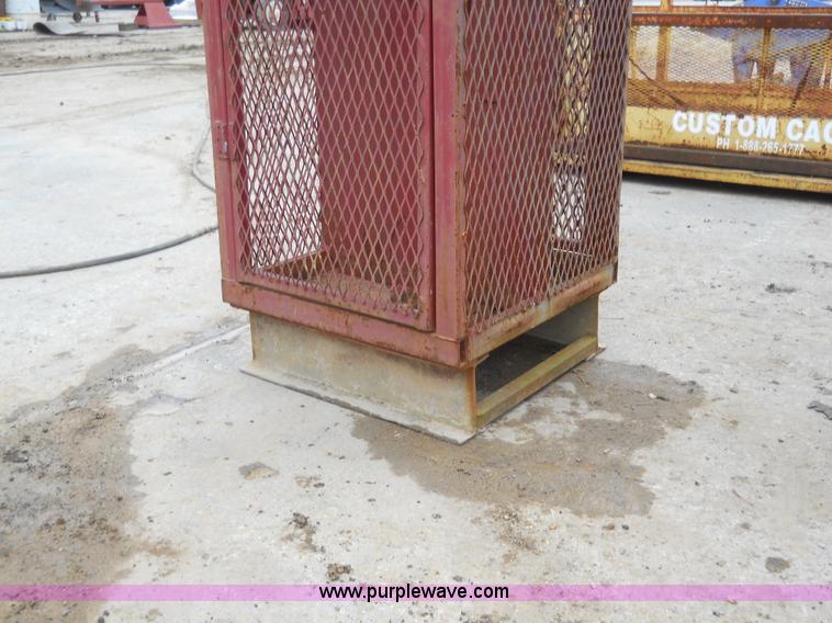 image for item 7837 (2) propane bottle cages