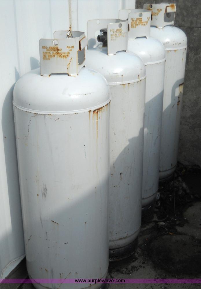 image for item 7853 (4) propane bottles