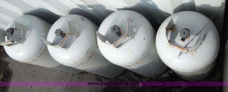 image for item 7853 (4) propane bottles
