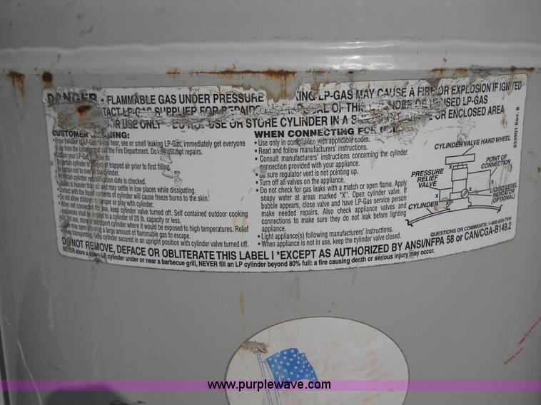 image for item 7853 (4) propane bottles