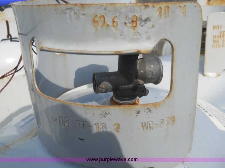 image for item 7854 (4) propane bottles