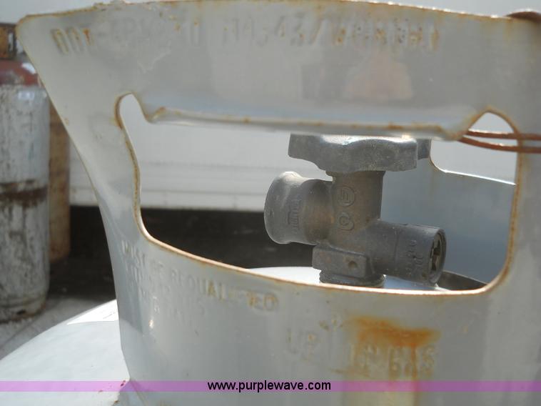 image for item 7854 (4) propane bottles