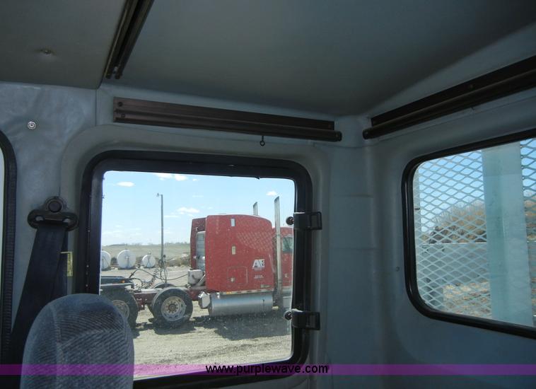 image for item 8517 1996 Freightliner FL112 service truck