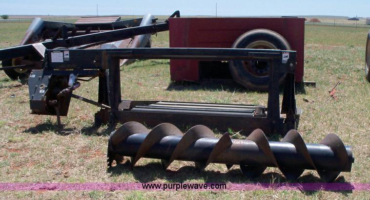 image for item 1002 1997 Mac Don 870 adapter for John Deere combine