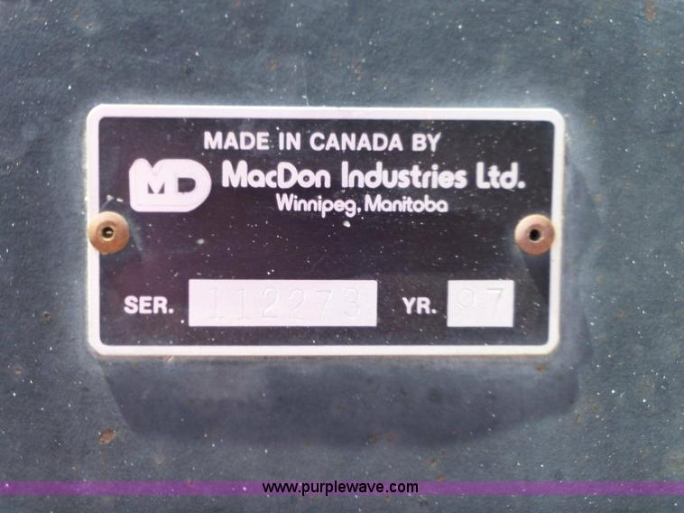 image for item 1002 1997 Mac Don 870 adapter for John Deere combine