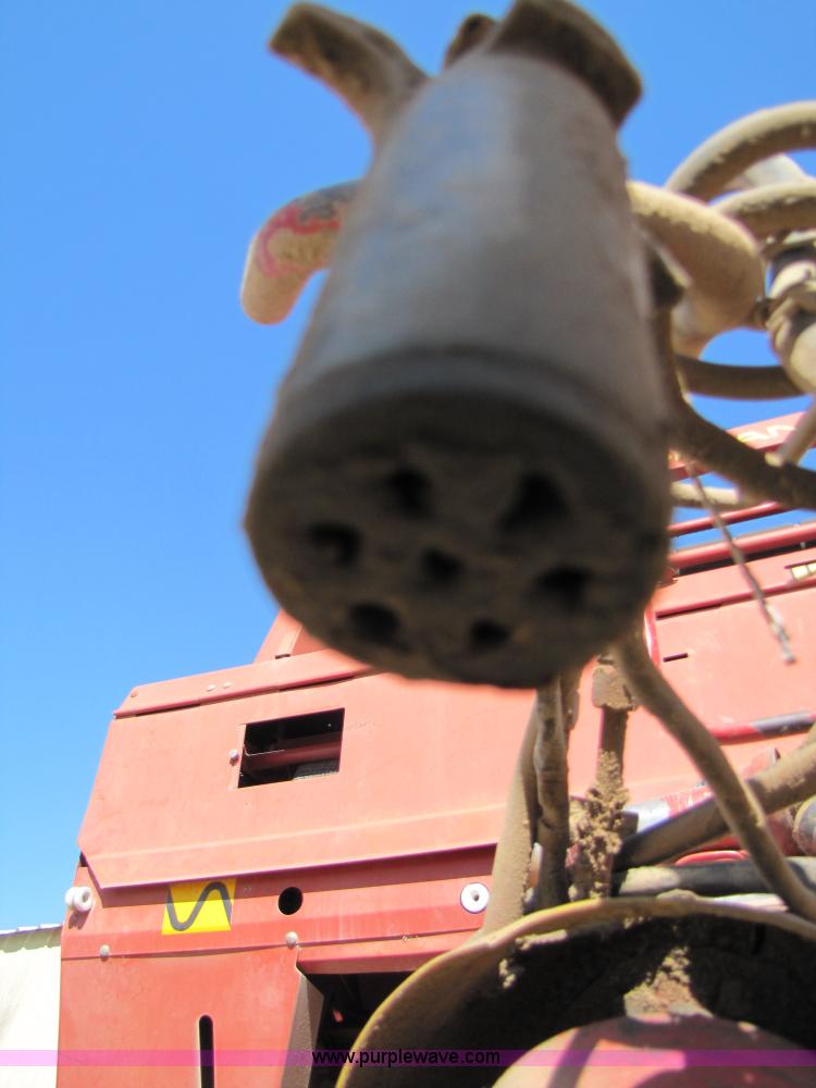 image for item 3452 1991 New Holland 660 FastNet round baler