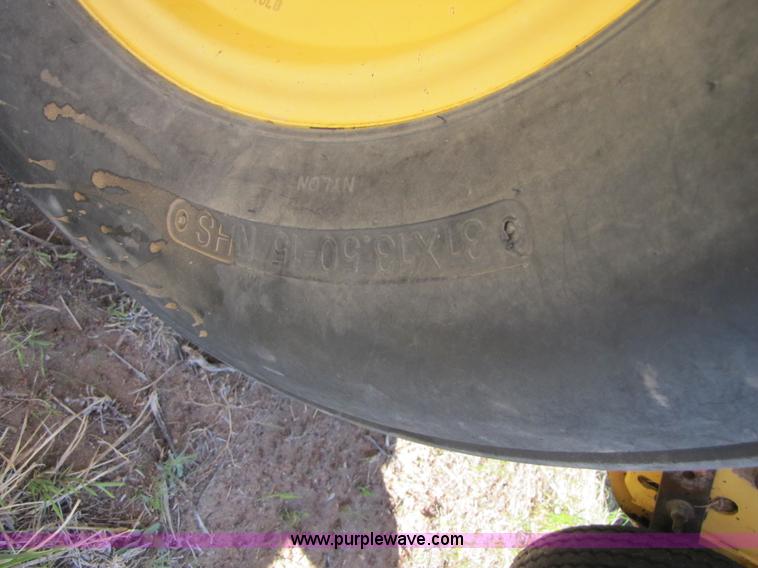 image for item 3452 1991 New Holland 660 FastNet round baler