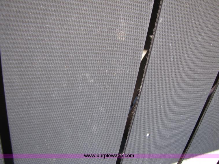 image for item 3452 1991 New Holland 660 FastNet round baler