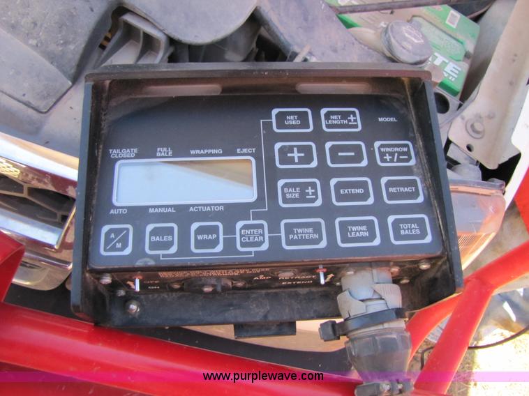 image for item 3452 1991 New Holland 660 FastNet round baler