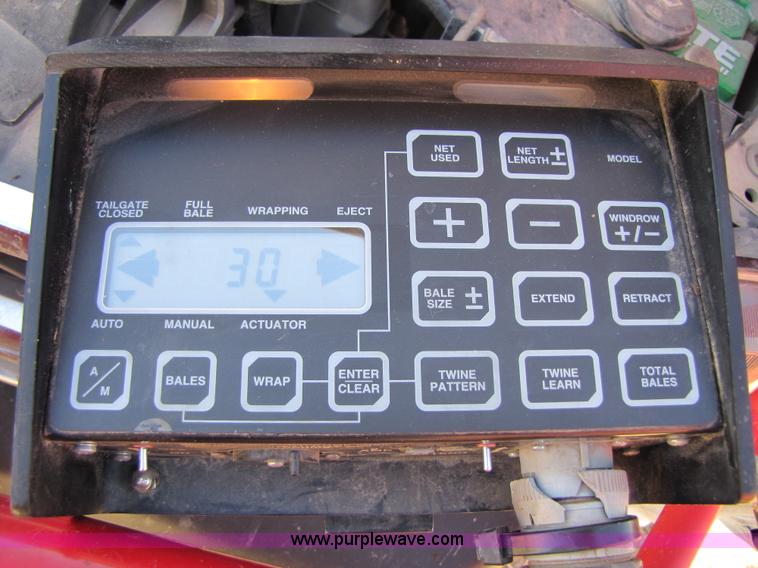 image for item 3452 1991 New Holland 660 FastNet round baler