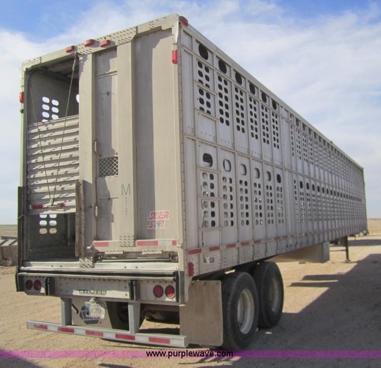 image for item 6486 1997 Wilson 53' straight deck hog trailer