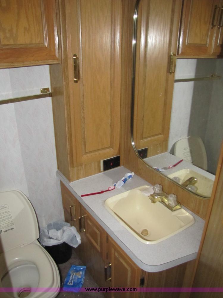 image for item 8480 1992 Chevrolet P30 Fleetwood Coronado RV motor-home