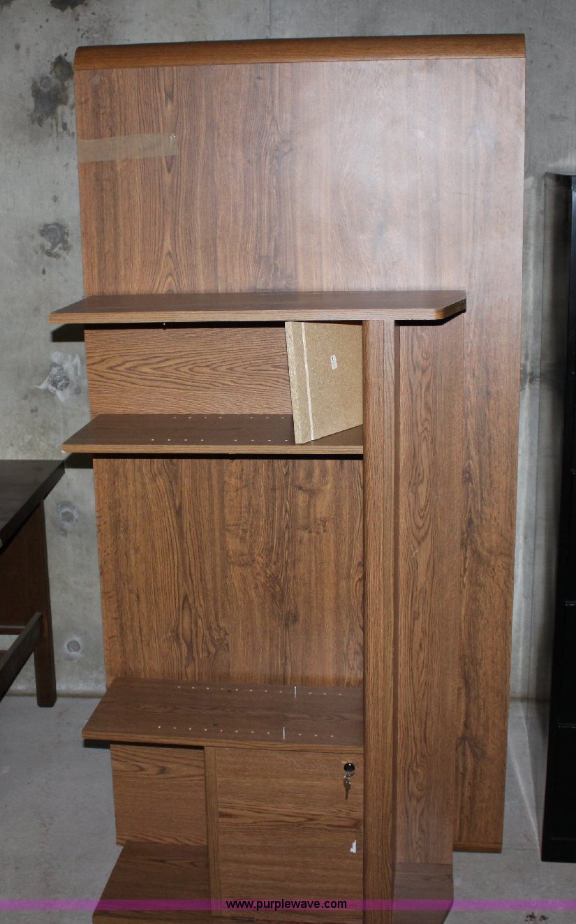 Assorted office furniture in Wichita, KS Item 6477 sold Purple Wave