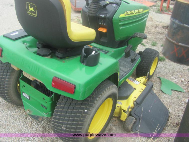 image for item 6169 2001 John Deere 325 lawn mower