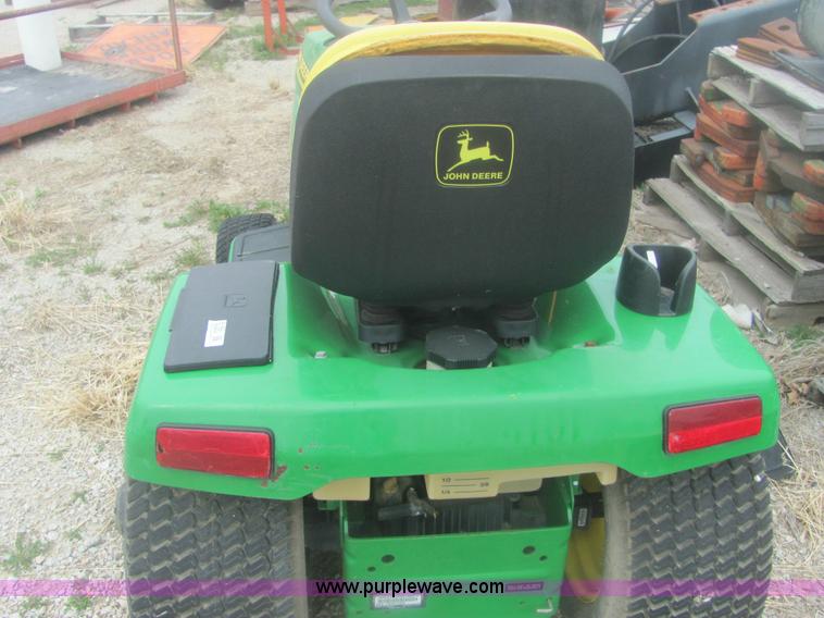 image for item 6169 2001 John Deere 325 lawn mower