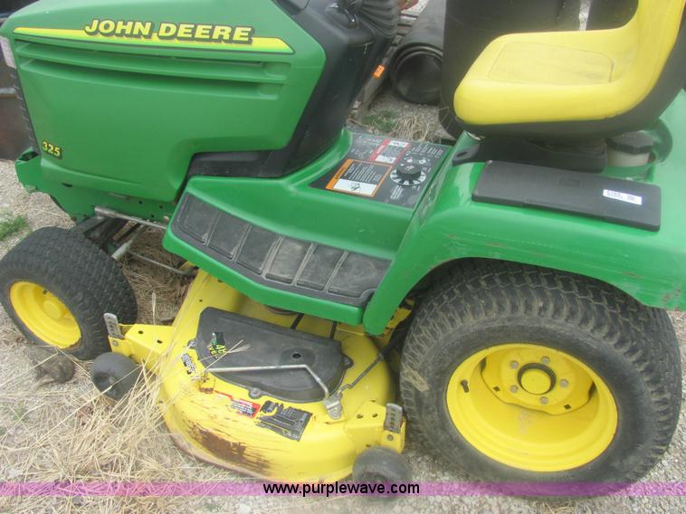 image for item 6169 2001 John Deere 325 lawn mower
