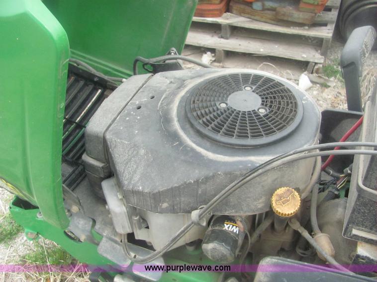 image for item 6169 2001 John Deere 325 lawn mower