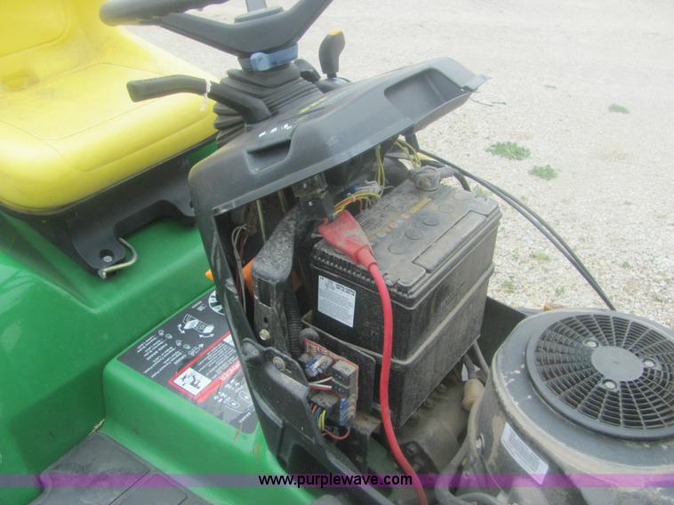 image for item 6169 2001 John Deere 325 lawn mower