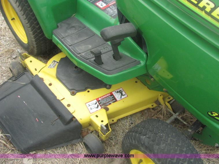 image for item 6169 2001 John Deere 325 lawn mower