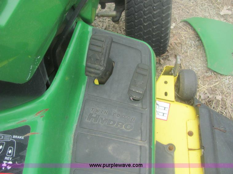 image for item 6169 2001 John Deere 325 lawn mower