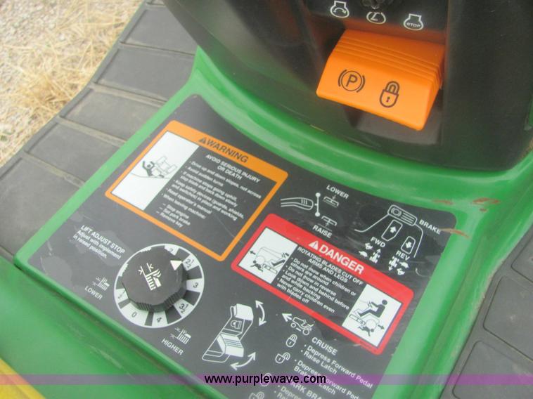 image for item 6169 2001 John Deere 325 lawn mower