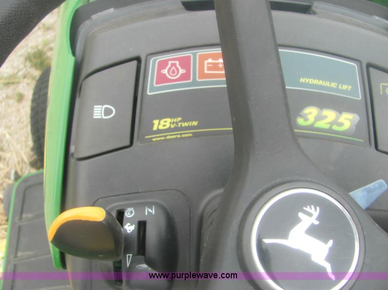 image for item 6169 2001 John Deere 325 lawn mower