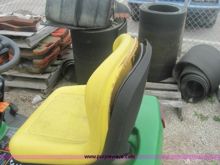 image for item 6169 2001 John Deere 325 lawn mower