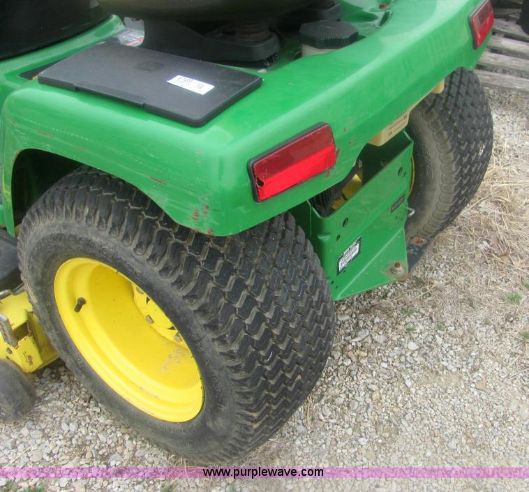 image for item 6169 2001 John Deere 325 lawn mower