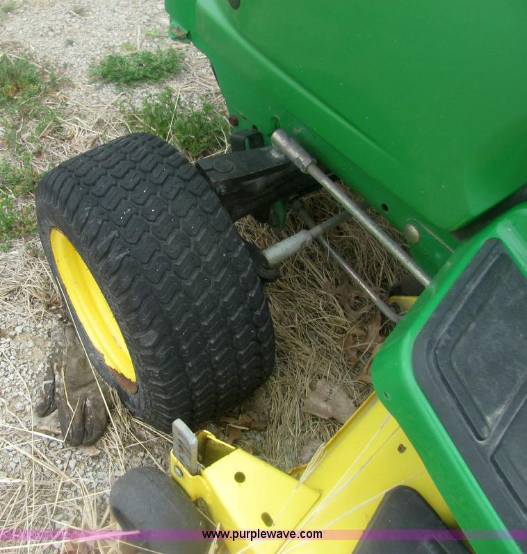 image for item 6169 2001 John Deere 325 lawn mower